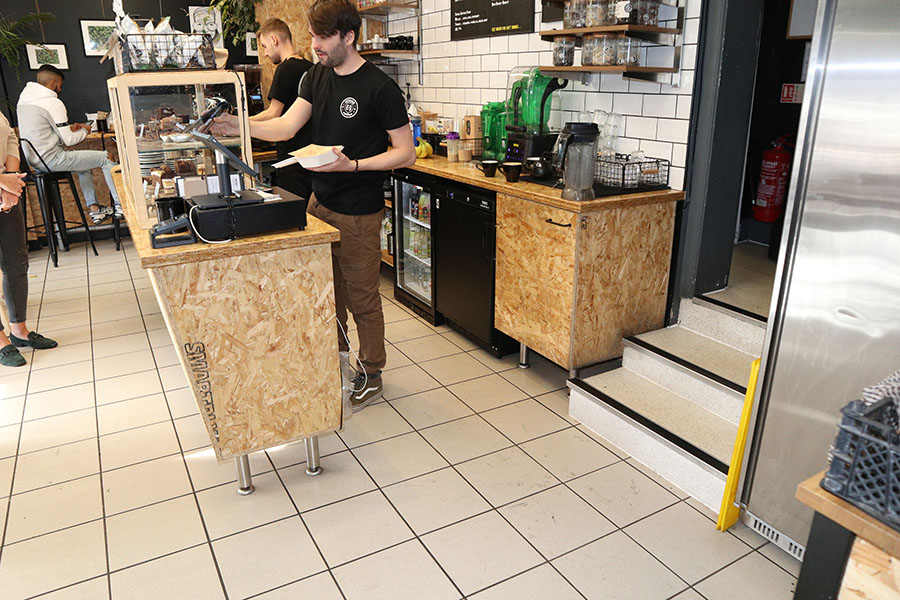 Shop fitting with flood-recoverable materials